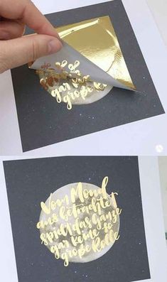 someone is cutting out some gold foil on the side of a piece of white paper