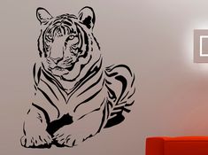 a black and white tiger wall decal in a living room