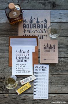 an assortment of food and drink items are laid out on a wooden table next to each other