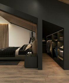 an image of a bedroom setting with black and white decor on the walls, wood flooring