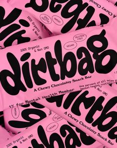 pink and black candy bar wrappers with the word dirtbab on it's side