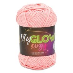 pink yarn ball with the words diy glow cosy written in white on it