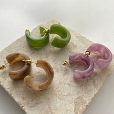 3 Gorgeous Pairs Of Unique Luxury Boutique Earrings, That You Will Be Sure To Receive Many Compliments On! Acrylic Jade Tone Acrylic Lavender Tone Acrylic Amber Tone Buy 2, Get 1 Free On All Jewelry Items From My Closet! (Free Item Will Be Of Equal Or Lesser Value) Check Out My Other Unique Boutique Jewelry! Boutique Quality Alloy, Hypoallergenic, Lead Compliant & Nickel Free (Great For Sensitive Ears) Brand New With Tags Be Sure To Check Out My Other Closet Bundle Sales All Items In My Closet C Trendy Small Hoop Purple Jewelry, Trendy Purple Small Hoop Jewelry, Trendy Purple Earrings For Everyday Wear, Trendy Purple Hoop Jewelry, Trendy Purple Hoop Earrings, Dope Jewelry Accessories, Edgy Jewelry, Lotus Jewelry, Trending Jewelry