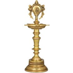 an ornate golden candle holder on a white background