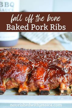 bbq ribs with barbecue sauce on top and the words fall off the bone baked pork ribs