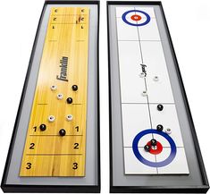 two wooden boards with arrows and numbers on them