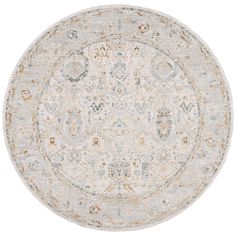 a round rug with an ornate design on the center and sides in grey, yellow and white colors