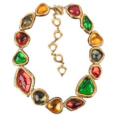 Yves Saint Laurent - (Made in France) Golden metal articulated necklace with colorful resin cabochons. Additional information: Condition: Very good condition Dimensions: Length: from 46 cm to 58 cm Seller Reference: BC213 Vintage Choker Necklace, Vintage Choker, Vintage Necklace, Made In France, Yves Saint Laurent, Metallica, Choker Necklace, Vintage Jewelry, Saint Laurent