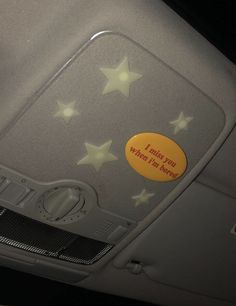 the inside of a car with stars on it and a sign that says, trust us when i'm bored