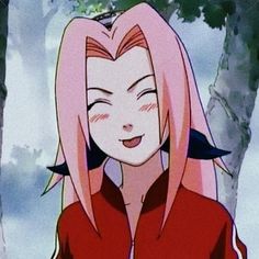 an anime character with pink hair standing in front of trees and looking at the camera