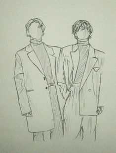 two men standing next to each other in front of a white wall and one is wearing a coat