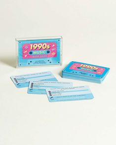 a couple of cards sitting on top of a table next to a game box with the words hippop music written on it