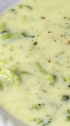 broccoli soup in a white bowl on a table