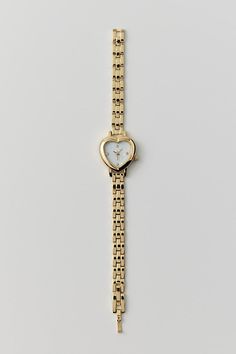 Linked chain watch watch topped with a heart-shaped case we love. Content + Care Mixed metal, glass Wipe clean Imported | Heart Linked Watch in Gold, Women's at Urban Outfitters Nice Watches For Women, Gold Watch Aesthetic, Christmas List Ideas For Women, Urban Outfitters Aesthetic, Heart Shaped Watch, L Heart, Jewellery Watch, Jewelry 2024, Chain Watch