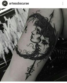 a woman's arm with a tattoo on it