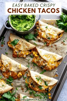 easy baked crispy chicken tacos with guacamole and cilantro