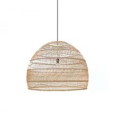 a hanging light made out of bamboo with a black cord on the end and a white background