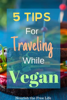 a sandwich with vegetables on it and the words 5 tips for traveling while vegan