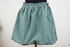 Vintage sage green mini skirt in mint condition. Seems handmade Shell feels cotton polyester blend Lining feels like cotton spandex blend Fits like women size M waist 34 cm = 13.4 inches hips open length 42 cm = 16.5 inches Cotton Mini Skort With Gathered Skirt, Green Mini Length Cotton Bottoms, Green Mini-length Cotton Bottoms, Green Mini Cotton Bottoms, Green Cotton Mini Bottoms, Green Mini Length Cotton Skort, Green Mini-length Cotton Skort, Green Mini Cotton Skort, Green Cotton Mini Skort