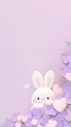 a cute little bunny sitting in the middle of purple flowers with hearts on it's chest