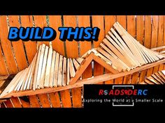 some wooden slats are stacked on top of each other with the words build this