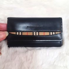 Authentic Burberry Black Leather Nova Check 3 Key Card Holder In Excellent Condition. Beautiful Smooth Leather Interior And Exterior Are Clean No Cracks, No Rips, No Tears 3 Hooks Middle Slot Can Hold Credit Card Snap Closure Is Strong Perfect For Your Pocket Size In Photo Please Review Photos As They Are Part Of The Description. Reposhing From @Tessywulan. Burberry Black, Burberry Accessories, Key Card Holder, Pocket Size, Leather Interior, Black Tan, Black And Tan, Smooth Leather, Snap Closure