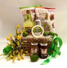 a basket filled with food and condiments on top of a table