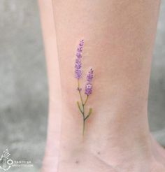 small lavender flower tattoo on the ankle