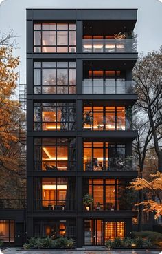 a tall black building with lots of windows