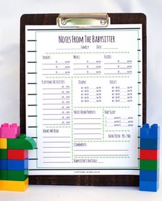 a clipboard with notes from the babysitter written on it next to legos