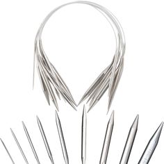 several different types of needles are shown in this image, including one with long pointed ends and