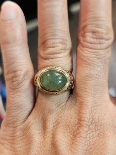 You are viewing a beautiful 14k solid gold jade ring. The ring size is 6  The ring is marked ming's and 14k. The band is 3mm wide. Beautiful gold leaf intricate design . Good pre owned condition Oval Jade Rings In Yellow Gold, Elegant Jade Ring With Round Band, Luxury Jade Jewelry For Anniversary, Carved 14k Gold Fine Jewelry, Fine Jewelry In 14k Gold With Carved Details, Polished Yellow Gold Jade Jewelry, Elegant Round Band Jade Jewelry, Fine Carved 14k Gold Jewelry, Elegant Yellow Gold Jade Rings