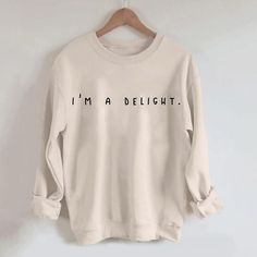 I'm A Delight Sweatshirt,Graphic Sweatshirt,Woman's Sweatshirt,Gift For Woman,Gift For Her,Birthday Gift,Funny Sweater,Anti Social Crewneck Welcome to Bee Design Gifts If you are looking for soft, comfy, first-rate sweatshirts, you're in the right place! I love what I do and strive to make your shopping experience just right for you. If you have any questions, concerns or comments about my products, feel free to send a message anytime. ⭐ 50% cotton, 50% polyester ⭐ Pre-shrunk ⭐Classic fit ⭐ 1x1 athletic rib knit collar with spandex ⭐ Air-jet spun yarn with a soft feel and reduced pilling ⭐Double-needle stitched collar, shoulders, armholes, cuffs, and hem HOW TO PLACE ORDER 1. Check photos for size chart, model comparison and color options 2. Select size and color from the drop down options Funny Sweater, Sweatshirt Graphic, Funny Sweaters, Sweatshirt Style, Gift For Her Birthday, Gift For Woman, Anti Social, Printed Sleeves, Look Plus