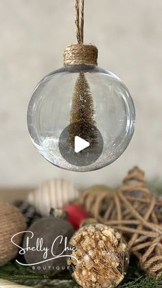 a glass ornament hanging from a rope