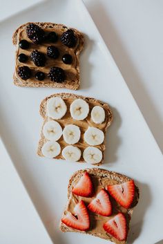 two slices of toast with fruit on top