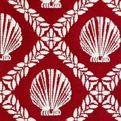 a red and white pattern with shells on it