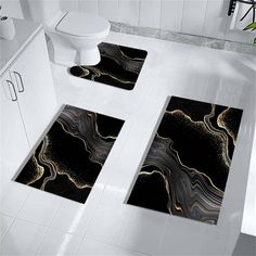 bathroom rugs with black and gold designs on them