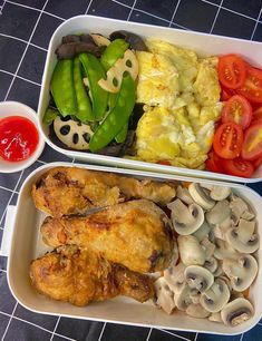 two trays filled with different types of food