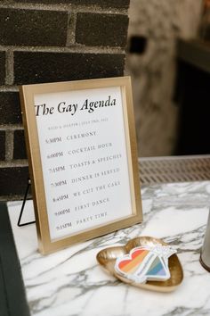 The Gay Agenda wedding sign for classic black tie gay wedding Queer Wedding Reception, His And His Wedding, Lesbian Wedding Signs, Wedding Signing Ideas, Wedding Ideas Lesbian Receptions, Trans Wedding Ideas, Lgbtq Wedding Two Brides Ideas, Poly Wedding Ideas, Mlm Weddings Aesthetic