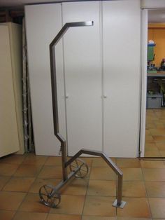 a room divider with wheels on the floor