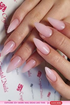 a woman's hands with long, pink nails and manies on her nails