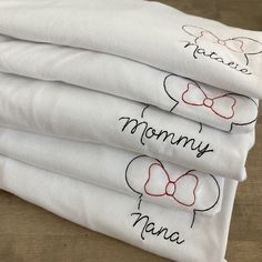 Set of family tees with customized font and name. Each will include either a Minnie or Mickey outline, complete with name of your choice. For toddler tees, I use 100% organic cotton t-shirts, for youth/kids and adult sizes I will use unisex Bella+ Canvas tees in white. For women you have a choice of a relaxed fit womens t-shirt or unisex.   Infant/toddler sizes: 0-3 months ( (t-shirt or short sleeve bodysuit) 3-6 months (t-shirt or short sleeve bodysuit) 6-9 months  (t-shirt or short sleeve bodysuit) 12 months  (t-shirt or short sleeve bodysuit) 18 months  (t-shirt or short sleeve bodysuit) 2T 3T 4T 5T Sizes available for youth kids t-shirts: S-XL Sizes available for adult unisex t-shirts: S-XXL Sizes available for women's relaxed fit t-shirts: S-XXL You will need to leave the size, name, Disney Embroidery Shirts Kids, Customizable White T-shirt For Family Matching, Customizable White T-shirt For Family Events, Sister Disney Outfits, Disney Embroidery Shirts, Family Matching White T-shirt With Embroidered Text, White Family Matching T-shirt With Embroidered Text, White Embroidered T-shirt For Family Matching, Customizable Cute White T-shirt