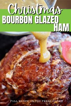 christmas bourbon glazed ham is being drizzled with sauce