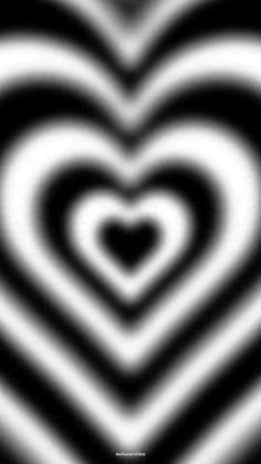 an abstract black and white background with a heart shape in the center, as if it is