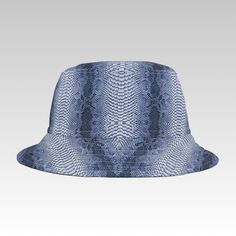 Make a bold statement with this bucket hat, featuring a striking Blue White snake skin print that adds an exotic edge to your wardrobe. The textured, lifelike pattern creates a fierce and stylish look, perfect for anyone looking to stand out.  This hat effortlessly combines trend-setting design with personalized options, allowing you to choose your seam lines and stitching colors for a truly unique accessory. * Material: 100% high-quality polyester with vibrant Blue and White snake skin print * Available in 2 sizes for the perfect fit * Durable sewn-in label for premium quality * Proudly made in the USA Step up your fashion game with this sleek, modern bucket hat--a must-have for anyone looking to turn heads. ** THIS PRODUCT IS MADE TO ORDER! For that reason, we would not accept returns or Hat Festival Outfit, Hat For Beach, Rave Hats, Outfit Streetwear, Snake Skin Pattern, White Snake, Skin Pattern, Vibrant Blue, Festival Outfit