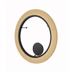 a circular mirror with a black and gold frame on the front, against a white background