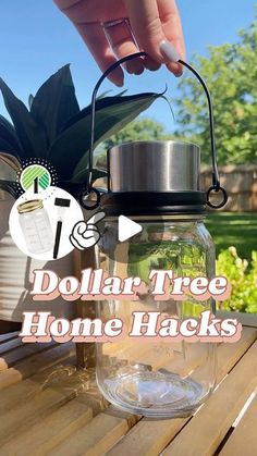 a person is holding a jar with water in it and the words dollar tree home hacks