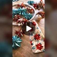 paper flowers and other decorations on a table