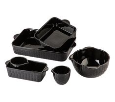 four black dishes are shown on a white background