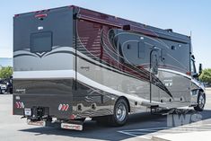 a motor home parked in a parking lot